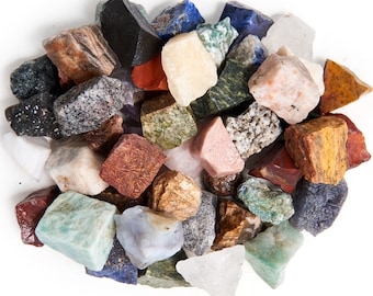 May include: A collection of various colorful and textured rocks and stones. The rocks are a mix of sizes and shapes, including some that are smooth and polished.