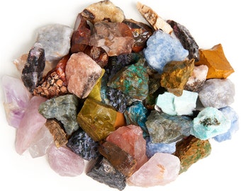 May include: A collection of colorful, rough-cut gemstones, including amethyst, rose quartz, turquoise, and agate.