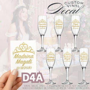 May include: Custom vinyl decals for champagne flutes. The decals are gold and feature names and dates, with a crown design. A separate decal with the text "Madrina Magali" and the date is also shown. The image also includes the text "Custom Vinyl Decal".