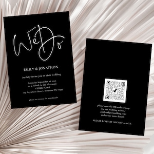 May include: Black wedding invitation cards with white text. The front card reads "We Do" in cursive, with the names Emily & Jonathon, wedding details, and venue information. The back card has a QR code and RSVP instructions.