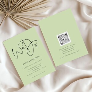 May include: Two light green wedding invitations. The front of the invitation has the words "We Do" in elegant black script. The names "Emily & Jonathon" are printed below. The back of the invitation has a QR code and website information.