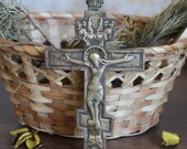 An ancient brass cross of the 18th century Crucifixion