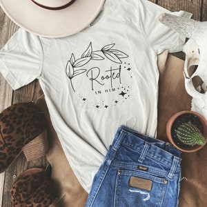 𝚁𝚘𝚘𝚝𝚎𝚍 𝙸𝚗 𝙷𝚒𝚖 Graphic Tee, Christian Tee, western Tee, ladies shirt