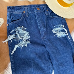 Distressed Wrangler Jeans image 3