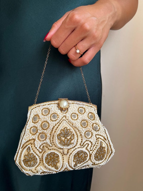 Small cream clutch bag hotsell