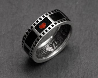 Personlig filmrullering i sterlingsilver: Graverade biosmycken