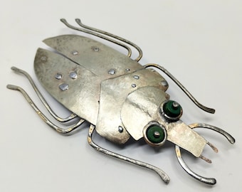 A beetle brooch