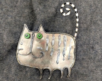 A cat - brooch pin