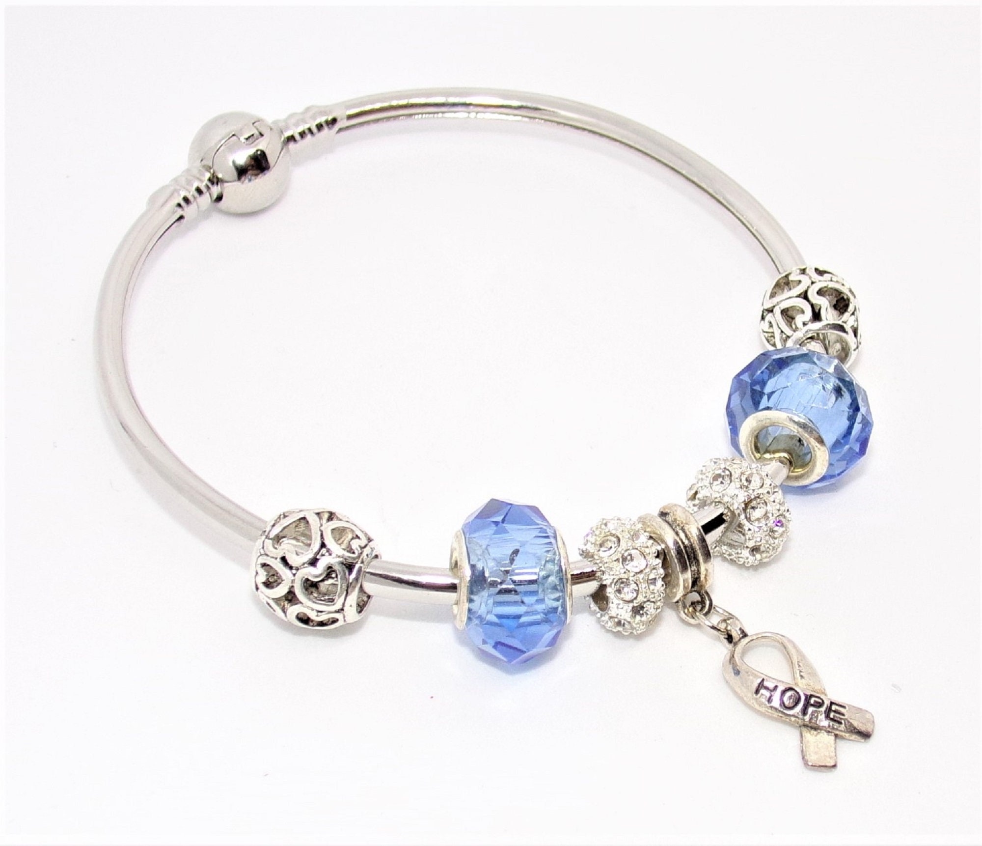 JONC bracelet with silver and blue Pandora style charms JONC bracelet with silver and blue Pandora style charms