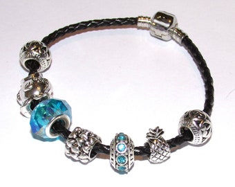 "Pandora" style black leather bracelet with turquoise charms