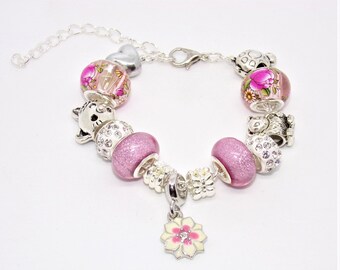 Bracelet ENFANT avec des charms Argent et rose de style Pandora