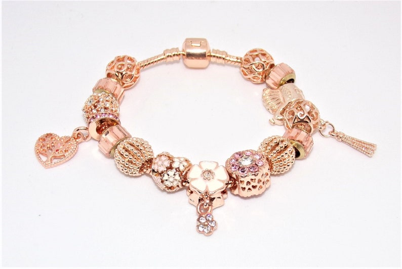 Bracelet with Pandora-style rose gold charms image 1