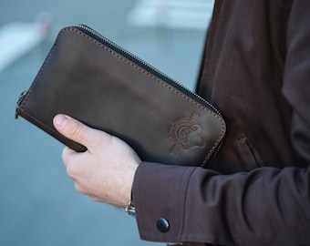 Cartera de mano de cuero