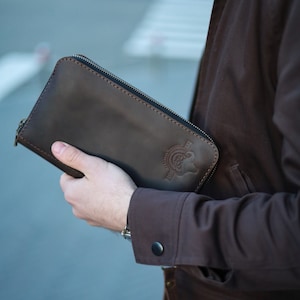 Cartera de mano de cuero