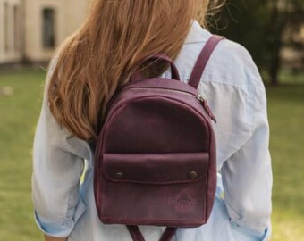 burgundy mini backpack Goyard Alpin Coated Canvas this mini backpack is sleek and stylish in smooth Leather Mini Backpack in Burgundy