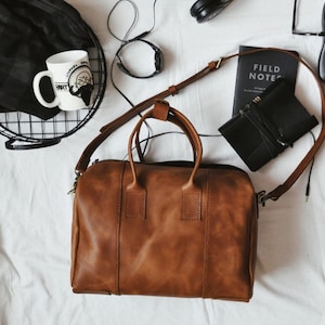 Women&#39;s Orange Leather Shoulder Bag: Travel, Duffle, and Weekend Bag