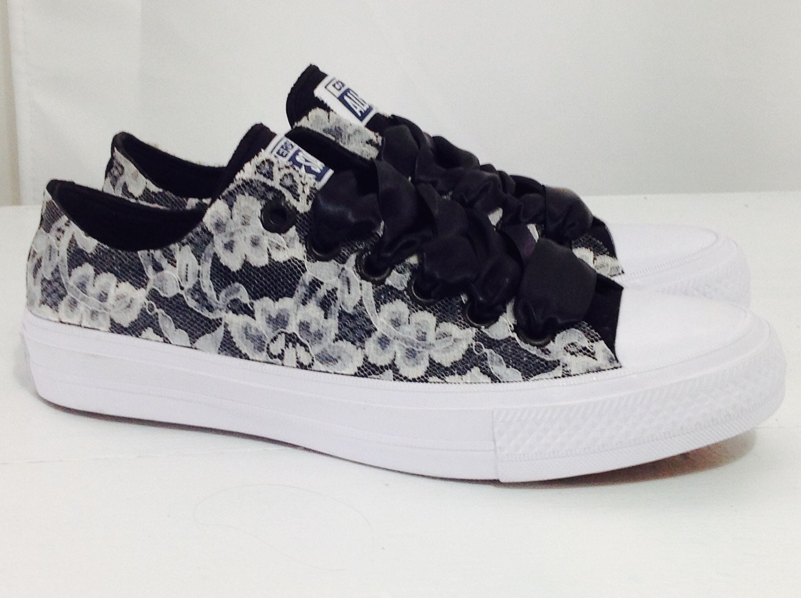 black and cream converse