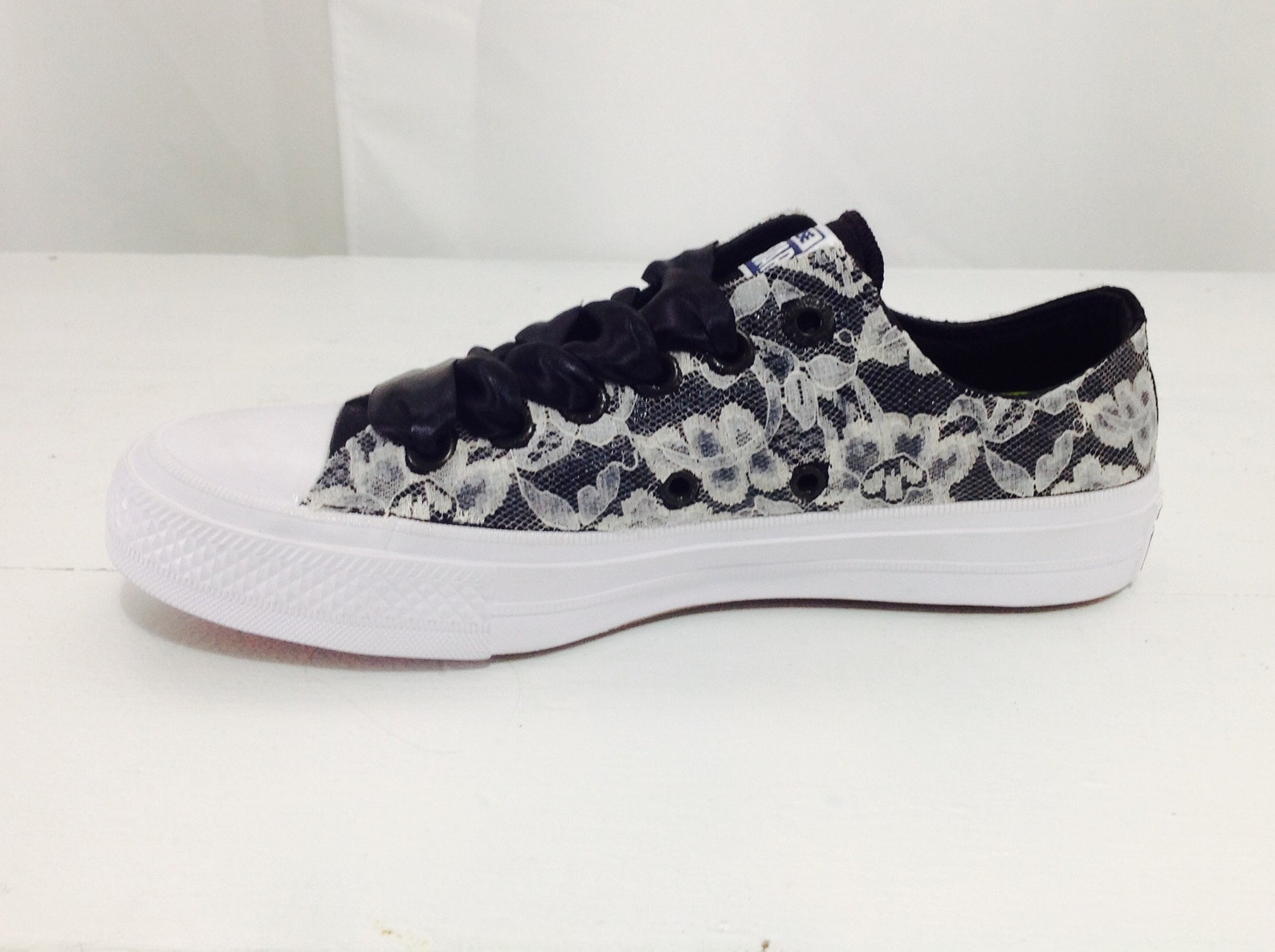black and cream converse