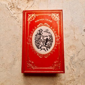 Livre pour enfants illustré vintage en français « Robinson Crusoé » par Daniel de Foe, édition de luxe de 1979.