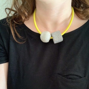 Modern concrete necklace with geometric elements