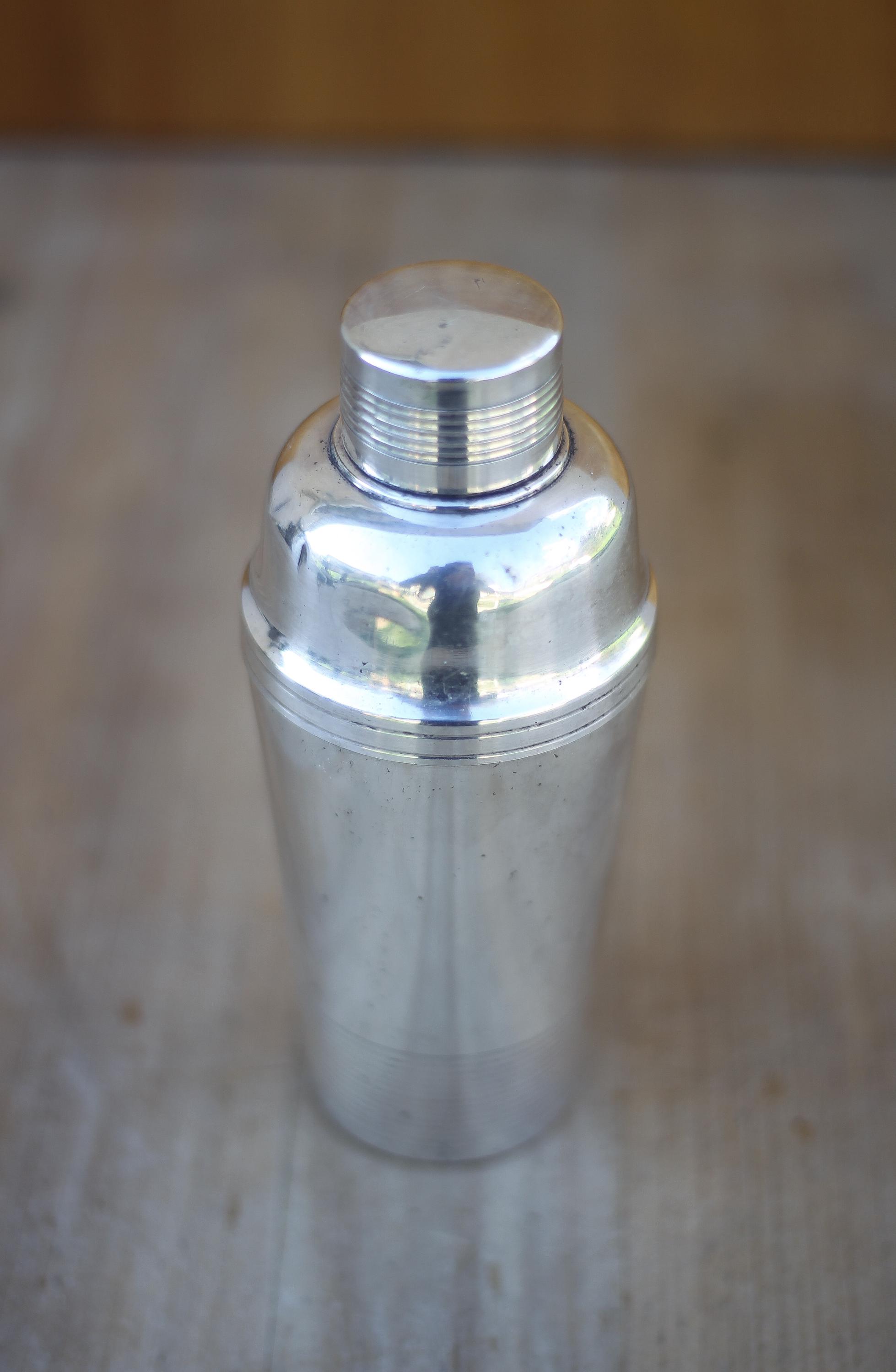 Shker à cocktil rt Déco frnçis en métl rgenté c.1930 pr St