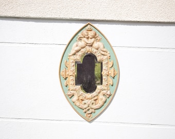 Repoussé mirror with angels and chimeras, beveled mirror, oval mirror, wall mirror, antique polychrome mirror, interior decor, angel mirror