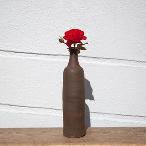 Vintage terracotta bottle, dark brown bottle, vintage vase, interior design, primitive, deformed bottle, brutalist