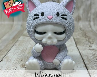 Whispurr, el Skubbie: Un dije de calavera chibi para tu bolso, coche, cartera o llavero. Listo para enviar.