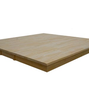 May include: A light wood platform bed frame with a simple design. The frame is made of solid wood and has a natural finish.