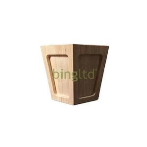 May include: A wooden furniture leg with a square shape and a beveled edge. The leg is unfinished and has a natural wood color.