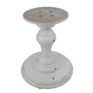 May include: White pedestal table base with a distressed finish. The base is round and has a fluted design. The top of the base is flat and has a circular hole in the center.
