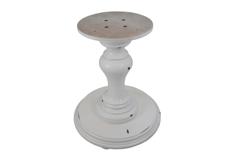 May include: White pedestal table base with a distressed finish. The base is round and has a fluted design. The top of the base is flat and has a circular hole in the center.