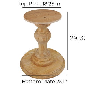 May include: Wooden table base with a round top plate measuring 18.25 inches in diameter and a round bottom plate measuring 25 inches in diameter. The base has a turned pedestal with a fluted design. The height of the base can be adjusted to 29, 32, or 37 inches.