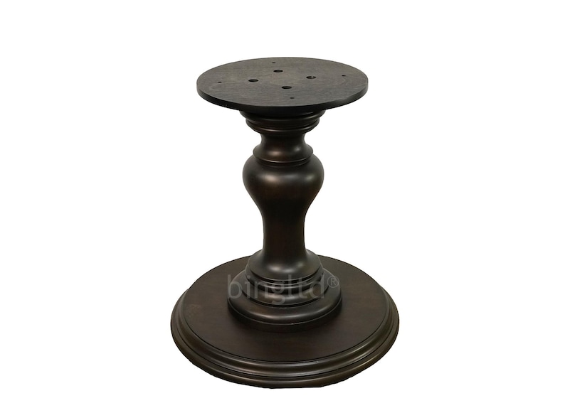May include: Dark brown wooden table base with a round top and a pedestal base. The base has a smooth, polished finish.