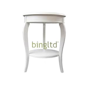 May include: A white, round side table with a small shelf and curved legs. The table has a classic design and is suitable for a living room or bedroom. The table is approximately 24 inches tall.