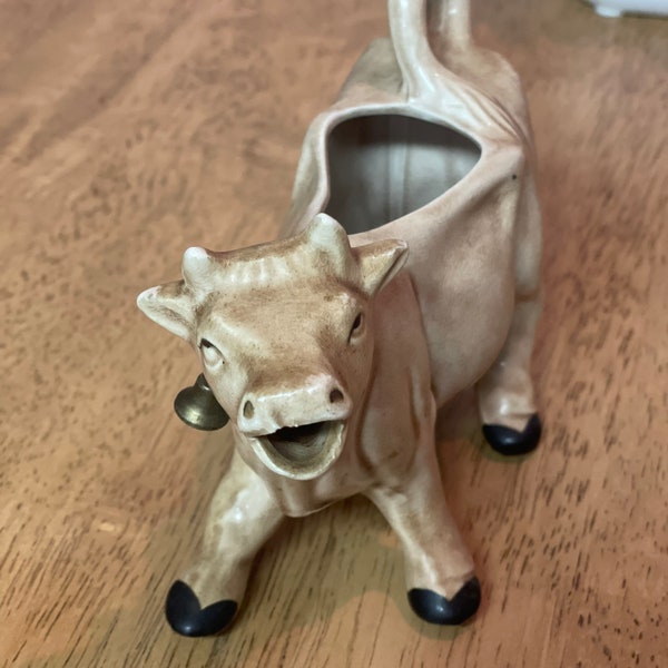 Vintage porcelain Cow creamer with bell