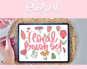 May include: A digital tablet displaying a set of floral stamp brushes for the Procreate app. The brushes feature various flowers, leaves, and stems in pink, red, and green colors. The text "Floral Brush Set" is displayed in pink on the screen.