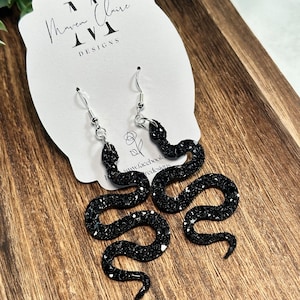 Reputation Snake dangles