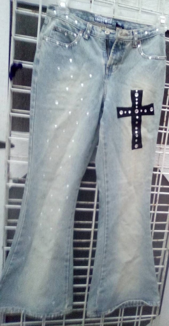 Jeans with cross on back pocket in rhinestones sales