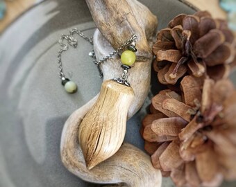 Pendulum in green oak wood