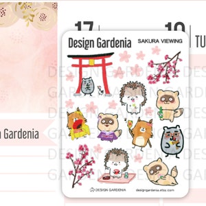 Sakura regardant des stickers • Stickers voyage au Japon • Stickers fleurs de cerisier • Sticker kimono • Stickers torii • Stickers temple • Stickers jeu