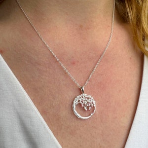 Collar de flor de cerezo