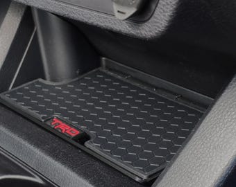 Storage tray for lower console. Toyota Tacoma 3rd Gen. (2016-2023)