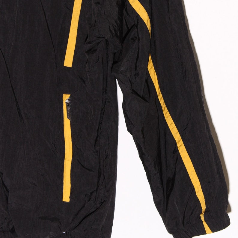 vintage 80s 90s windbreaker Reebok jacket black with pin stripes down sleeve and front oversized windbreaker track jacket 90s clothing