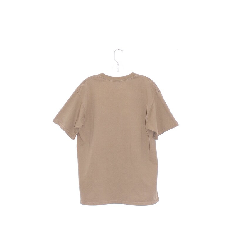 May include: A plain brown t-shirt hanging on a white hanger. The t-shirt has short sleeves and a crew neck.