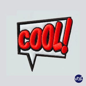 May include: Embroidered patch in a speech bubble shape with the word "COOL!" in bold red letters. The patch has a white background, a black border, and a black speech bubble tail.