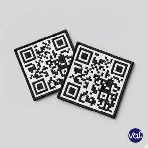May include: Two square black and white QR code patches. Each patch features a detailed QR code design within a black border. The patches are displayed on a light gray background.