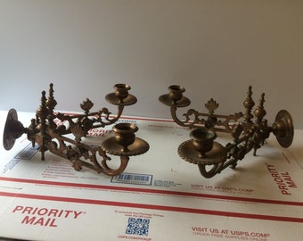 Old Castles Antique Dep. Muster Brass Candlestick fixtures.