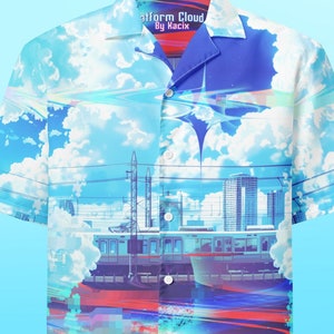 May include: A white short-sleeved button-down shirt with a colorful print featuring a cityscape, clouds, and a train. The shirt has a blue collar and the text "Platform Cloud by Kacic" on the front.