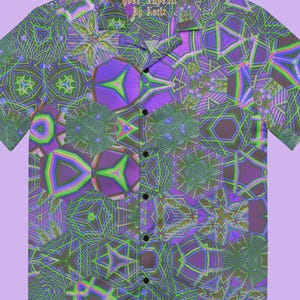 May include: Short-sleeved button-down shirt with a vibrant, geometric pattern in shades of green, purple, and neon green. The shirt features a collared neckline and black buttons. The text "cyber Investr By Turla" is printed on the collar.